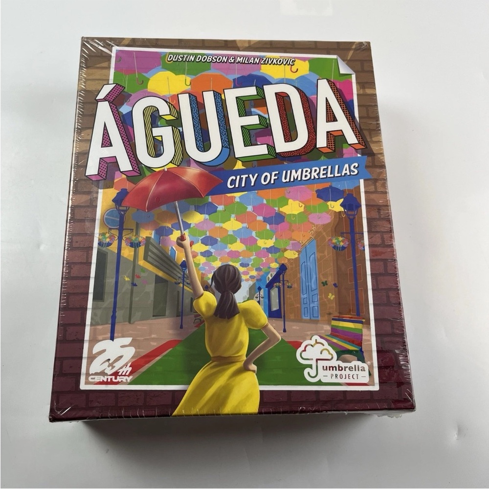 AGUEDA: CITY OF UMBRELLAS An Umbrella Creating Board Game
